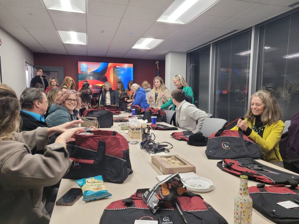 attendees receiving their goodie bags