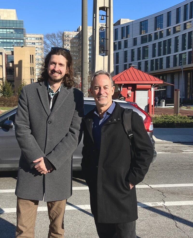 Chris Gittings and David Thompson outside on Temple University campus